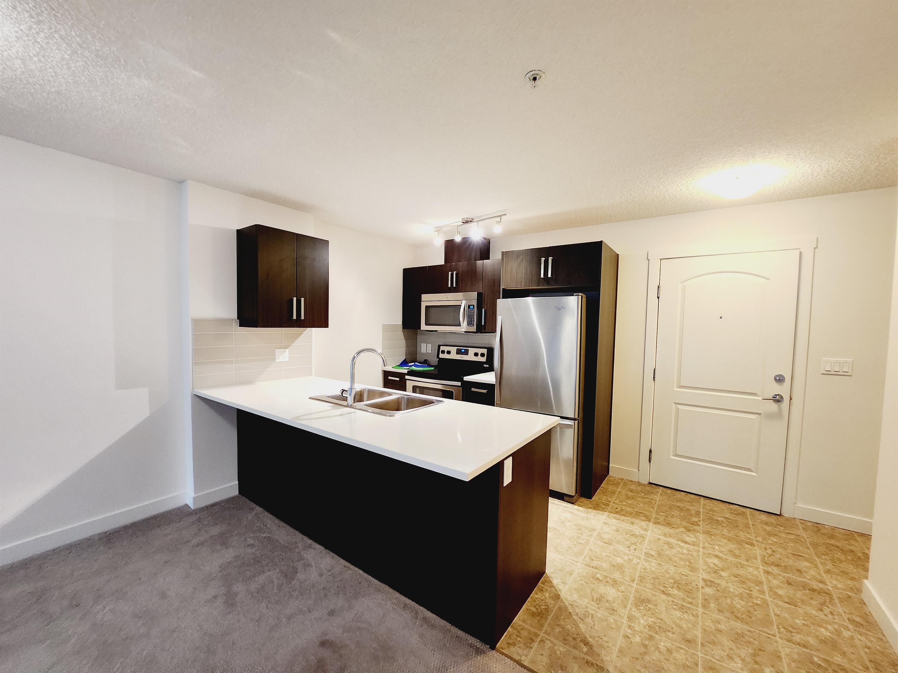 #101 - 667 Watt Boulevard SW - 1